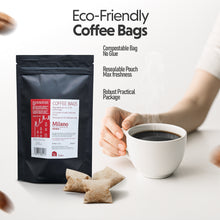 Eco-friendly coffee bags with a person holding a cup of coffee.