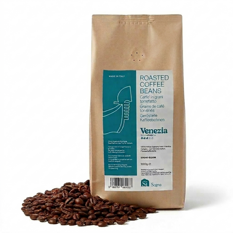 Bag of whole roasted coffee beans labeled Venezia, with coffee beans in displayed in front